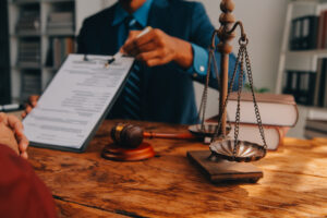 A solicit6or talks to a client about how to sue for an email data breach
