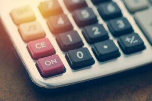 A data breach compensation calculator sitting on a table