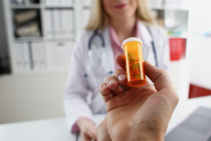 A doctor and patient talking about the correct dose that the pharmacy gives 