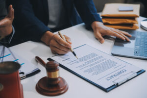 Solicitor explaining how to sue for a warehouse accident to client 