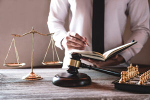 A specialist solicitor helping a claimant understand how to sue for a criminal injury