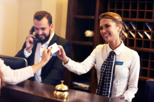 A guest checks in to a hotel.