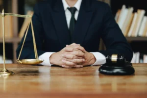 Cycling accident solicitor at desk working on how to sue for a cycling accident.